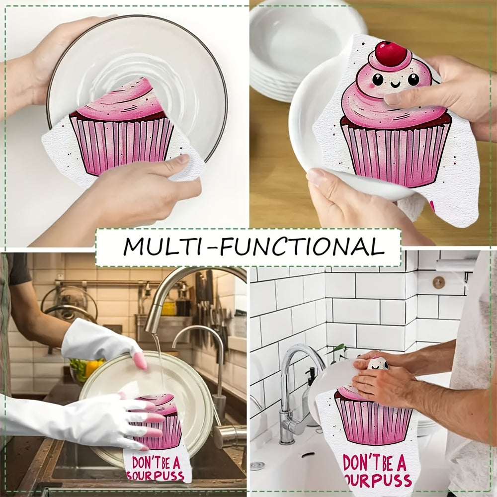 2 pieces of ultra soft kitchen towels featuring a "Don't Be A Sourpuss" cupcake design. These highly absorbent and machine washable dish hand towels have a contemporary style with pink and white stripes. Measuring 40.64x60.96 cm, they are perfect for