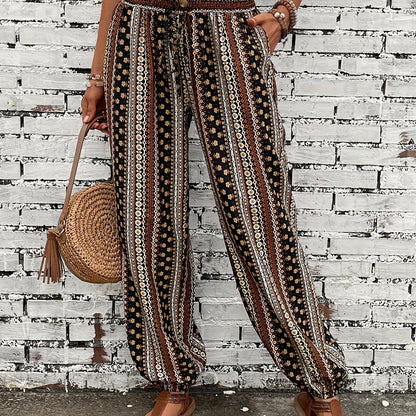 Ethnic style printed pants for women with pocket, button, and elastic waist in plus-size.