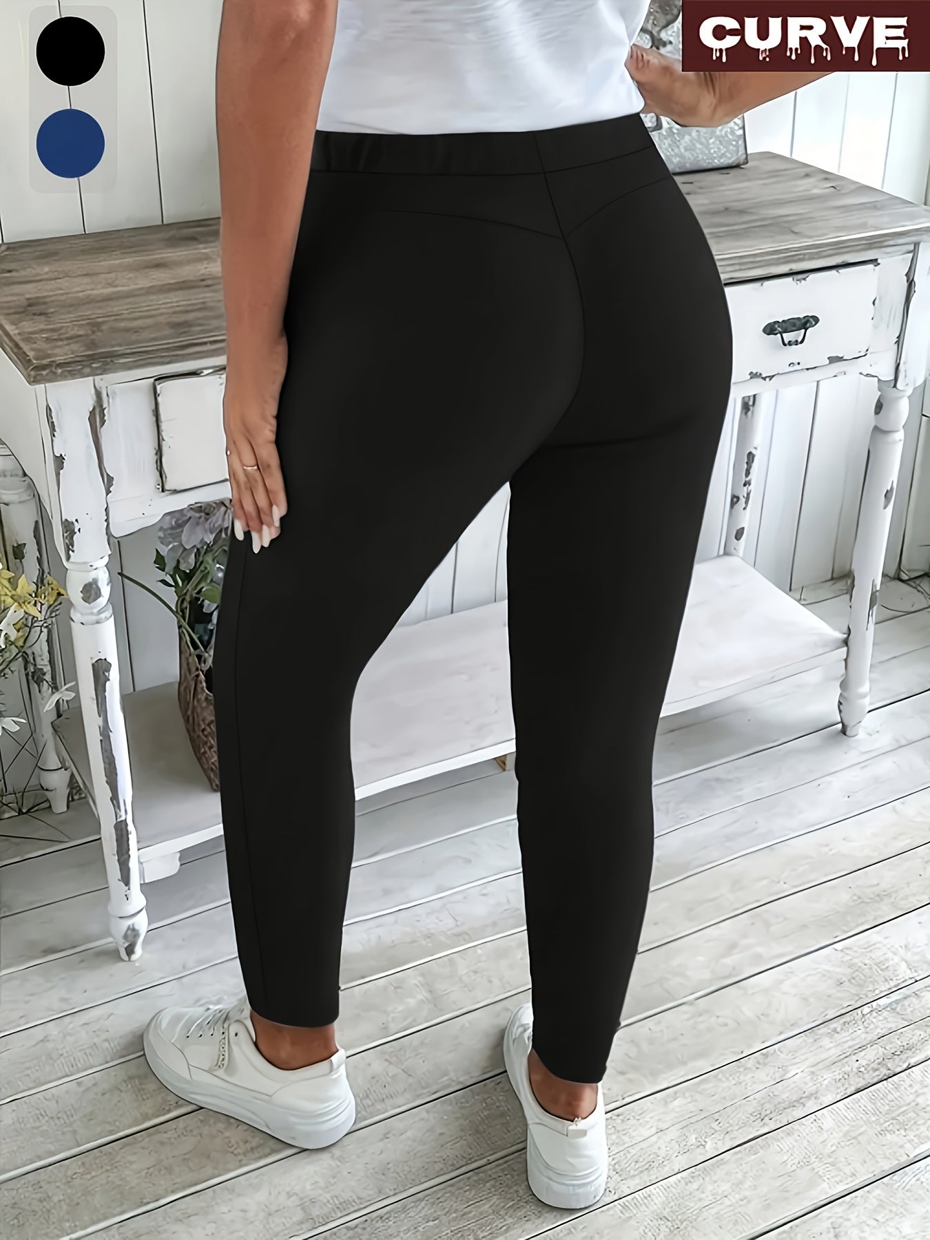 Women's plus size solid color straight leg pants with pockets, drawstring, and relaxed fit for casual wear.