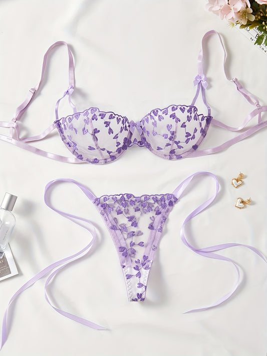 Purple mesh lingerie set with heart embroidery, bow decor, semi-sheer bra and tie side thong. Women's sexy underwear.