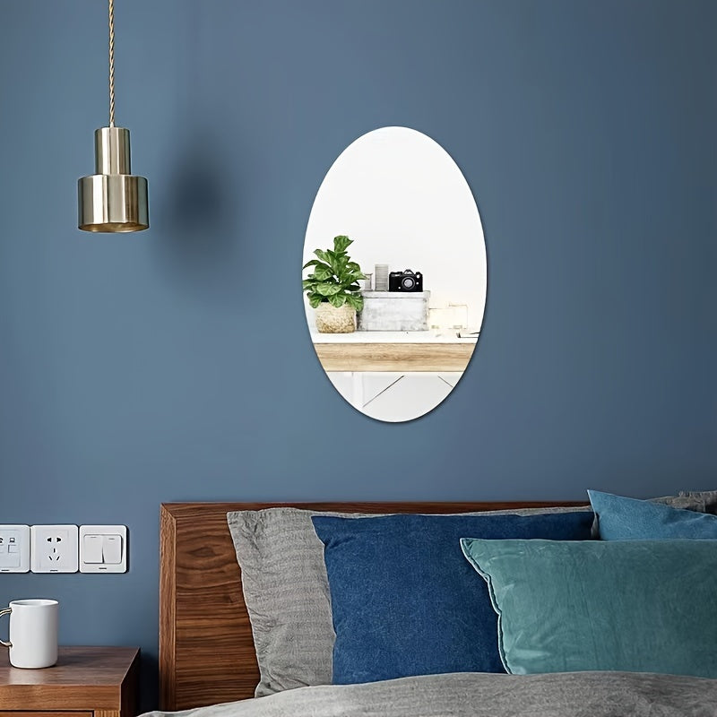 Oval acrylic mirror wall sticker, self-adhesive and removable, ideal for bathroom, living room, kitchen and more.