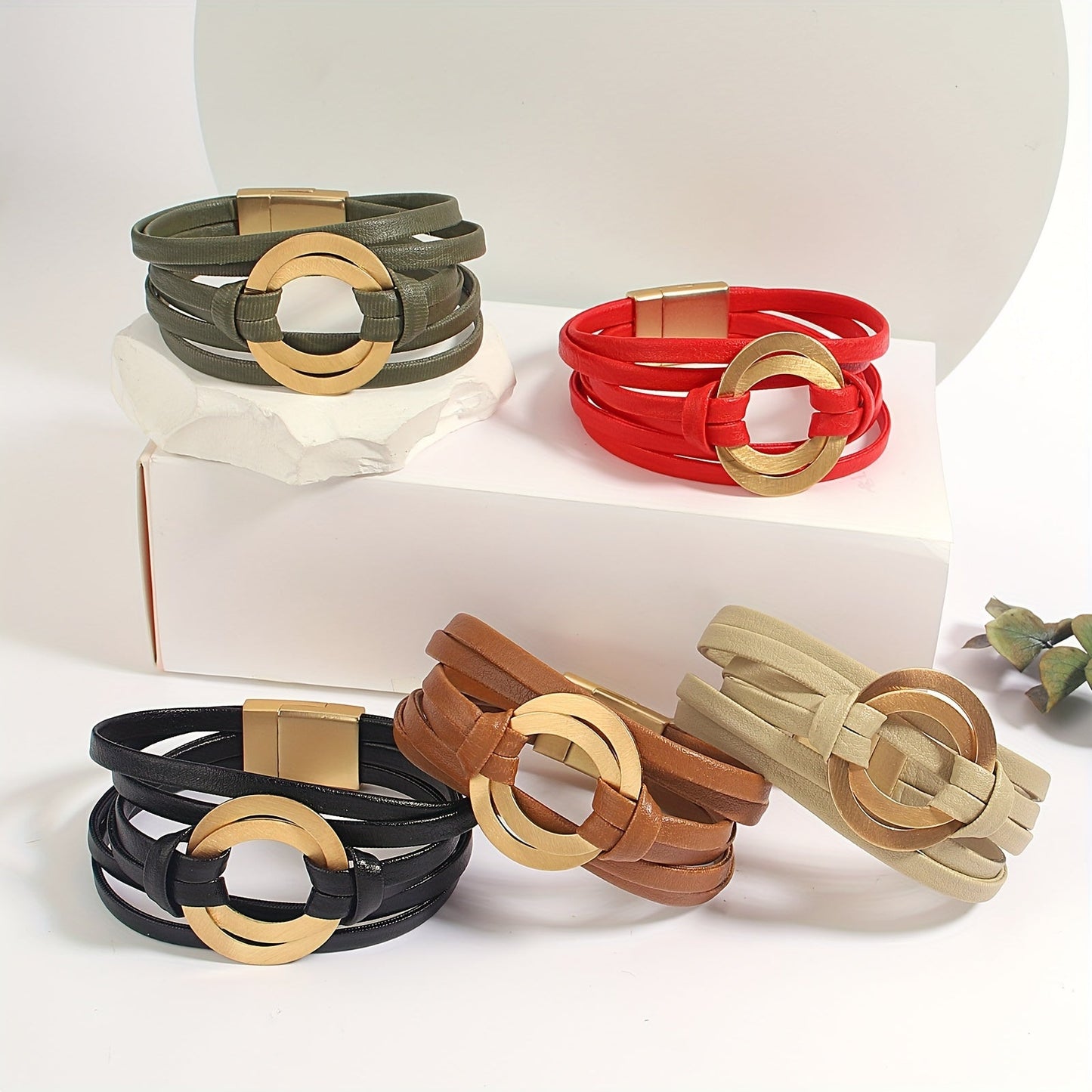 Artificial leather bracelet for women with double circle charm and magnet buckle clasp - a stylish wide bangle bracelet that makes a great gift.