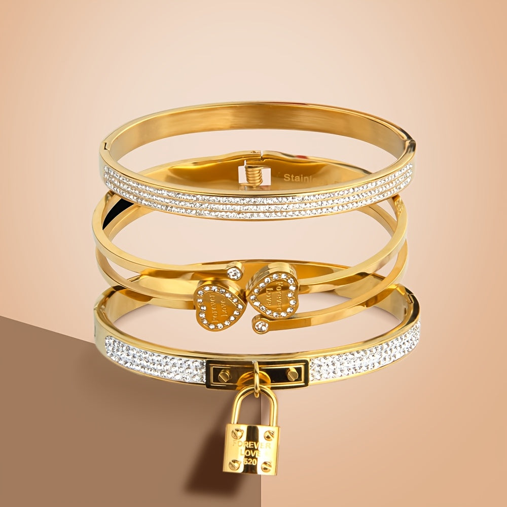 Stylish set of 3 stainless steel bracelets for women, plated in 18K gold with a heart-shaped pendant adorned with sparkling synthetic zirconia. The perfect luxury gift for weddings, parties, and Christmas, suitable for all seasons.