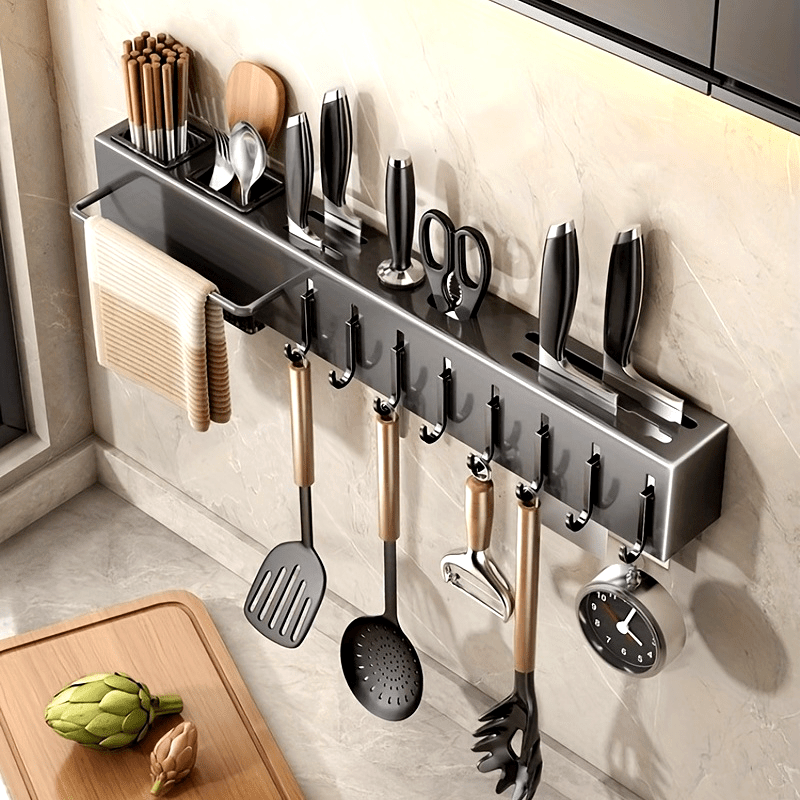 Wall-mounted stainless steel kitchen organizer featuring towel bar and hooks. Includes cutlery holder with chopstick cage for utensils and accessories.