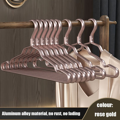 A pack of 10 durable metal hangers with a non-slip, seamless design for organizing coats and clothing in the bedroom or bathroom. Built to last for long-term storage.