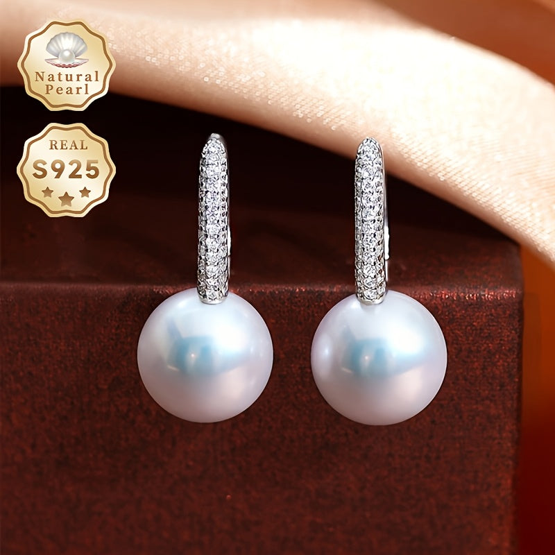 Upgrade your jewelry collection with the sophisticated and timeless MUFAN Elegant Vintage Style Freshwater Pearl Drop Earrings. These stunning earrings feature large 10-11mm round natural gemstones hanging from S925 sterling silver posts. Perfect for