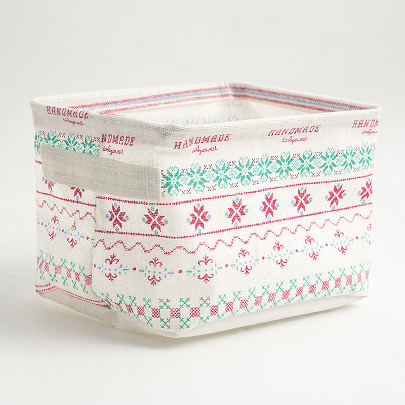 Waterproof desktop storage box made of printed cotton and linen with handle, suitable for organizing sundries.