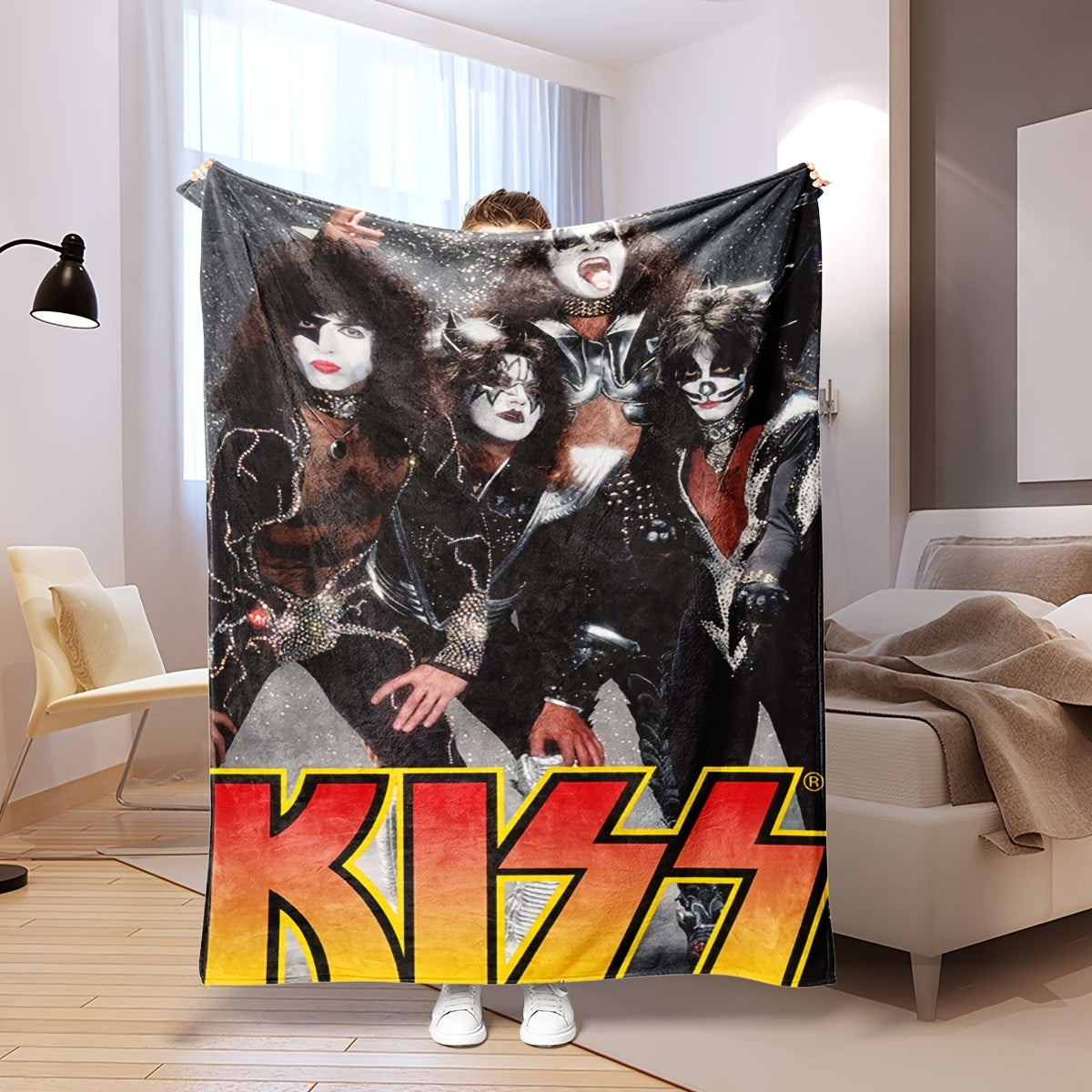 Add a touch of rock 'n' roll to your home with the KISS Rock Band-themed throw blanket. Made from knitted polyester, this lightweight blanket features a vibrant red and yellow gradient design, perfect for adding a contemporary style to your bedroom