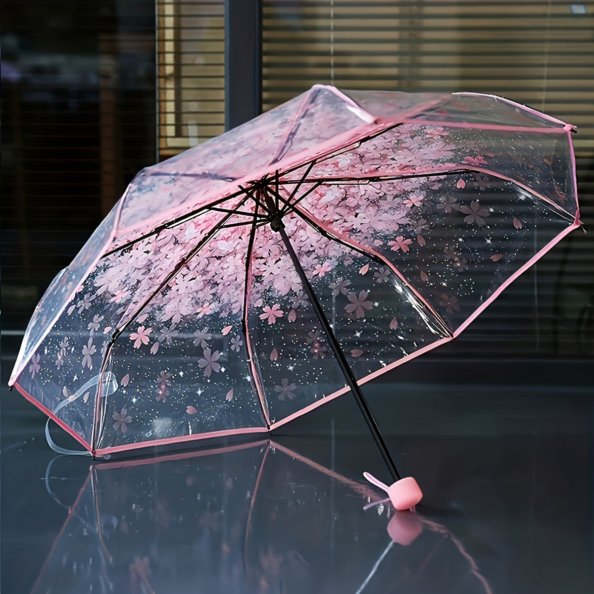 Chic cherry blossom folding umbrella for men and women, ideal for travel and outdoor activities.