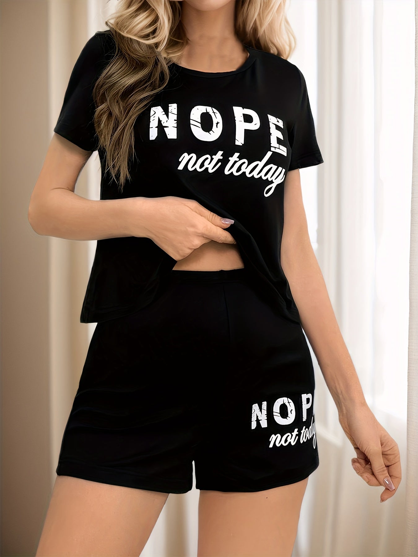 Valentine's Day pajama set with "NOPE Not Today" letter print, crew neck, knit fabric, medium stretch, all-season comfort, 95% polyester and 5% elastane.