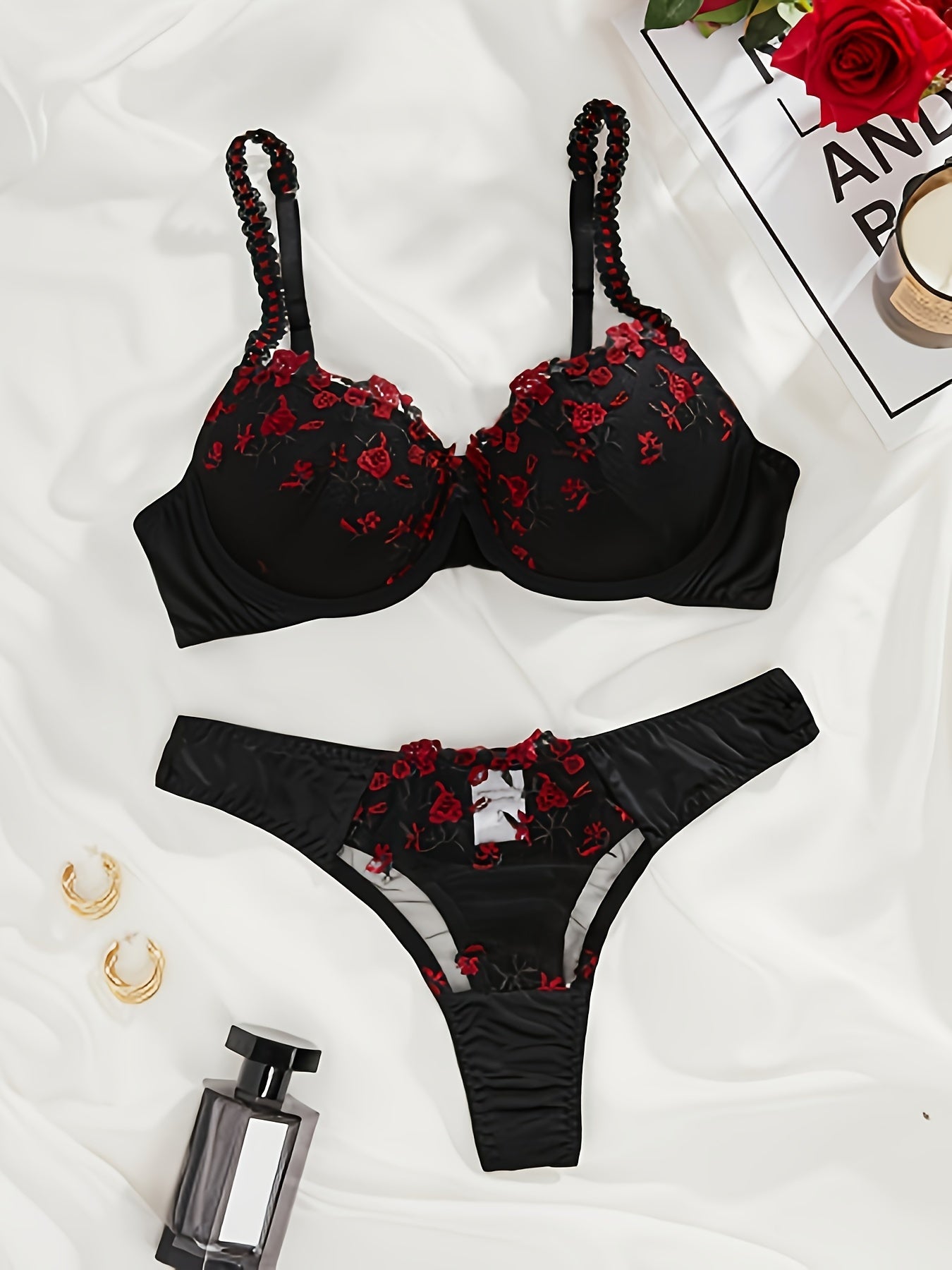 Floral embroidered honeymoon lingerie set with black half cup bra and thong for daily wear.