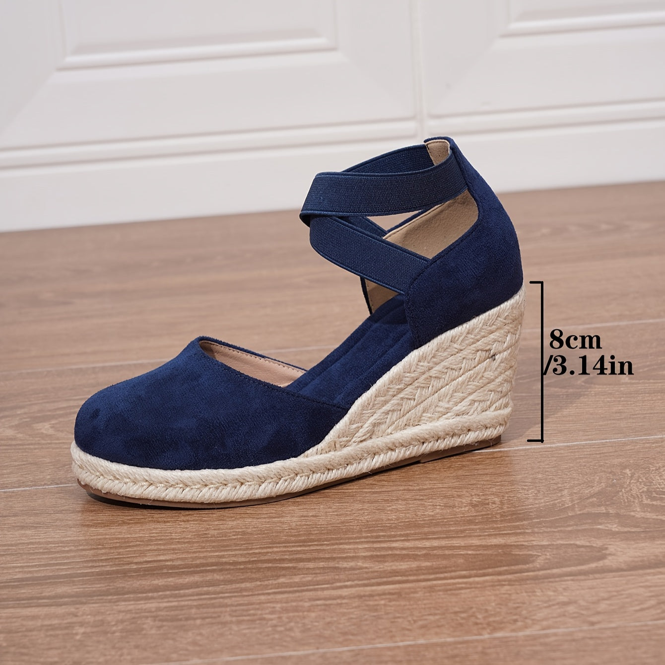 Women's slip-on wedge sandals with elastic cross straps, round toe, and non-slip sole.