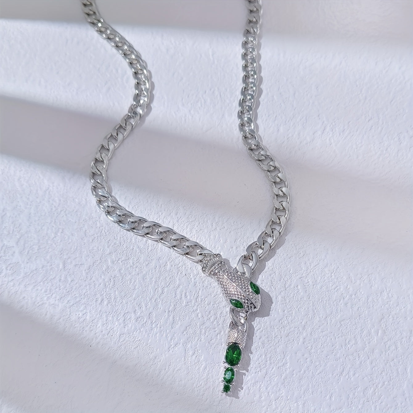 Add a touch of elegance with our stunning snake pendant necklace, adorned with shimmering rhinestones. Made from luxurious zinc alloy, this clavicle chain is perfect for women who want to stand out at parties or give a thoughtful gift.