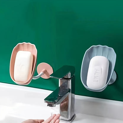 Durable plastic oval soap holder for the bathroom, easily mounted on the wall without drilling.