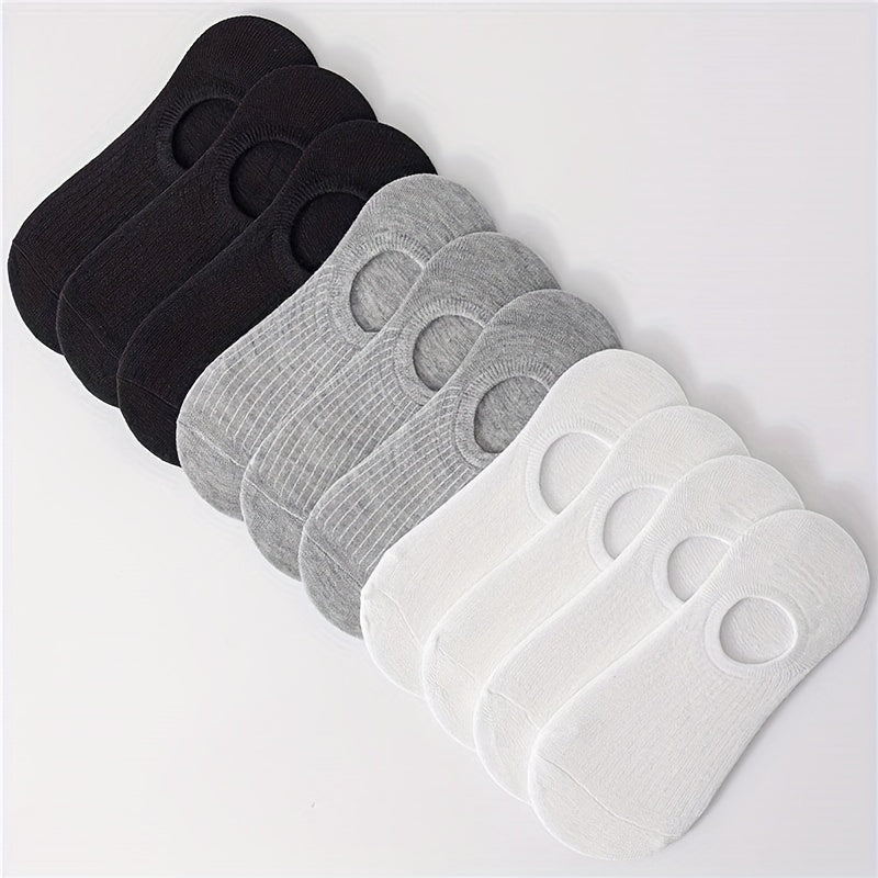 30 pairs of women's breathable no-show socks made of a polyester and spandex blend with moisture-wicking properties. These socks are black, white, and grey striped, with anti-odor