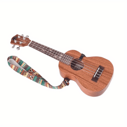 Colorful Hawaiian-inspired ukulele strap with geometric patterns, vibrant mixed colors, and a 4-string guitar hook backdrop.