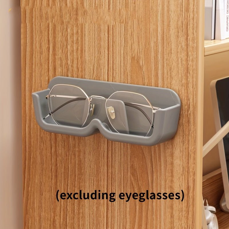 1 piece of Space-Saving Wall-Mounted Eyeglasses Holder, Stylish Display & Storage Tray without the need for drilling, made of plastic. Ideal for organizing women's fashion accessories and eyewear.