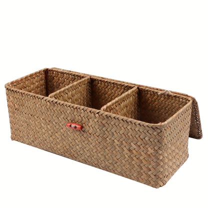 Rectangular seagrass storage basket with lid, durable woven organizer with compartments for snacks, toys, and more. Natural aesthetic with red button closure. Shelf baskets included.