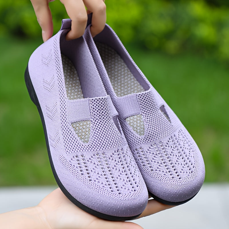 Breathable slip-on sneakers for women with soft sole and non-slip knit upper, ideal for casual wear.