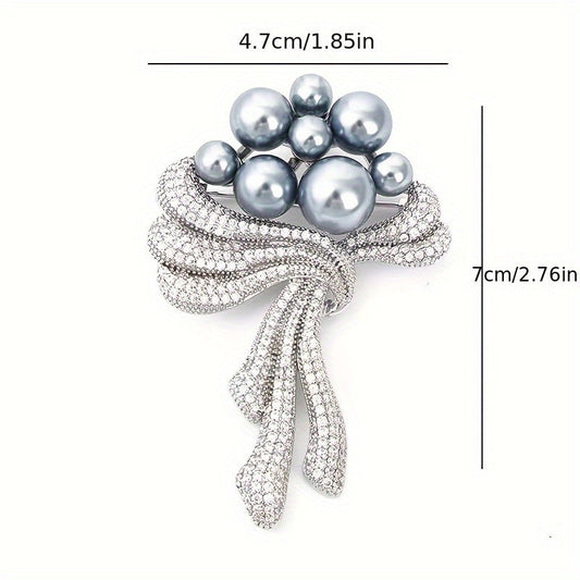 One piece of elegant vintage-style rhinestone brooch with pearl accents, a fashionable accessory for women's coats and outerwear.