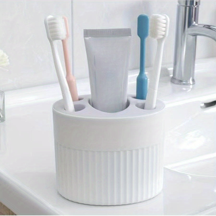 Toothbrush holder for household use, made of plastic. Can also be used as a storage box or organizer for toothbrushes and toothpaste in the bathroom.