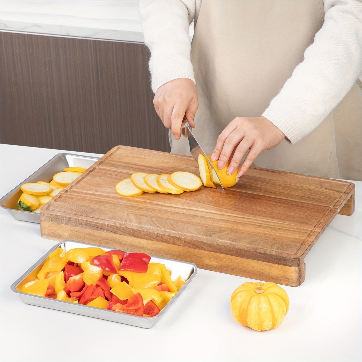 Large bamboo cutting board with integrated trays for easy food transfer, space-saving design, and non-slip surface. Features pull-out drawers for added functionality. Ideal for all your chopping and food preparation needs.