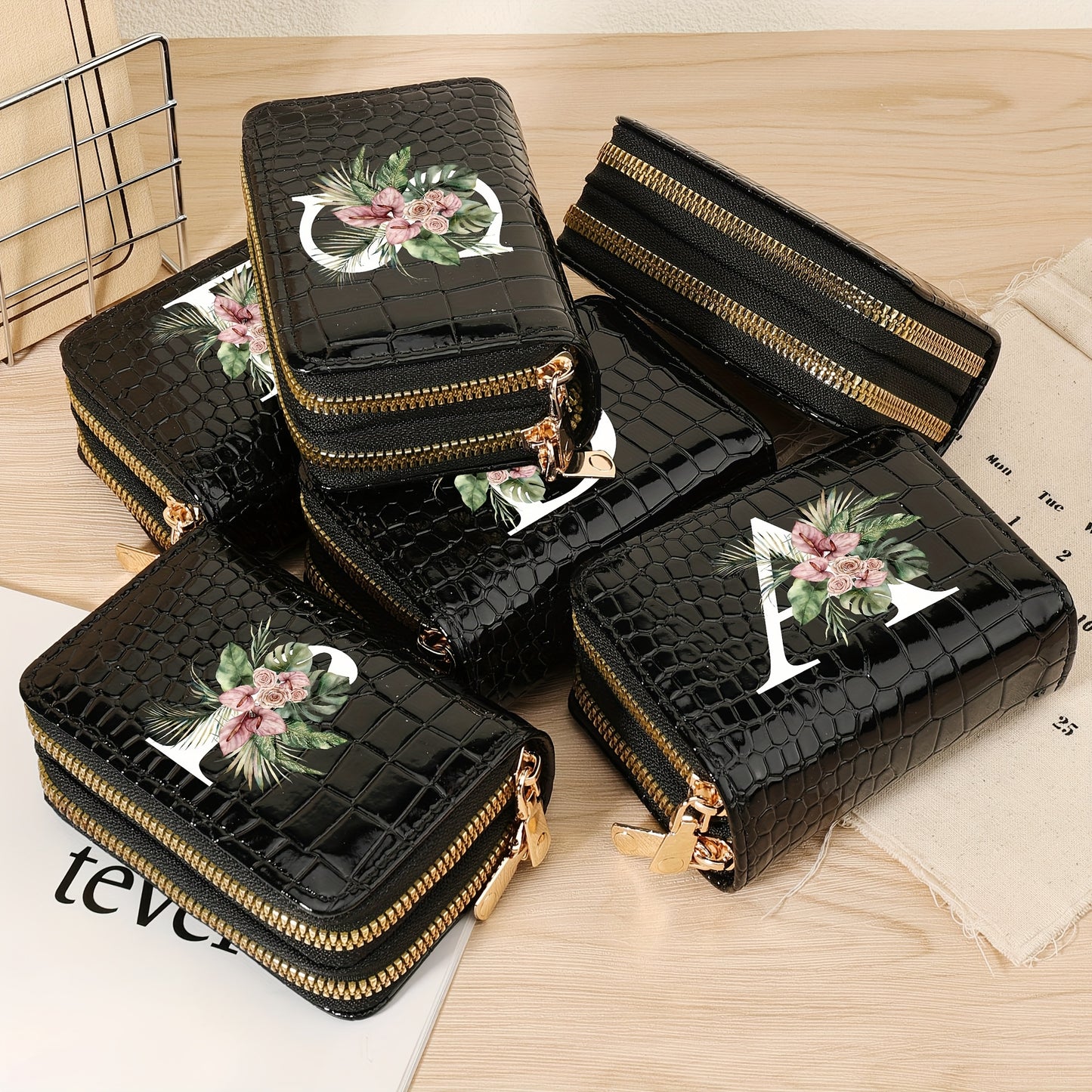 Women's credit card wallet with elegant floral letter print in black & white. Features large capacity, dual zipper, crocodile texture PU, lightweight design with nylon lining for everyday