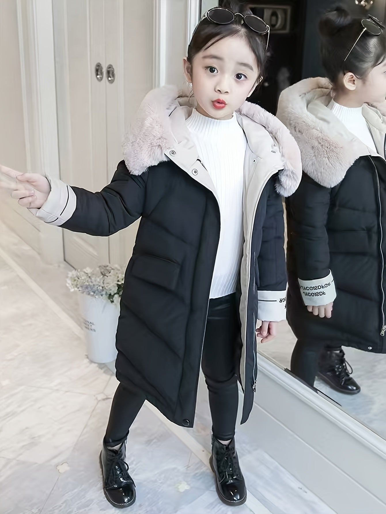 Girls' winter puffer coat with faux fur hood, embroidered alphabet detail, and casual skinny fit. Made of woven polyester, this thick warm jacket is perfect for cold weather.