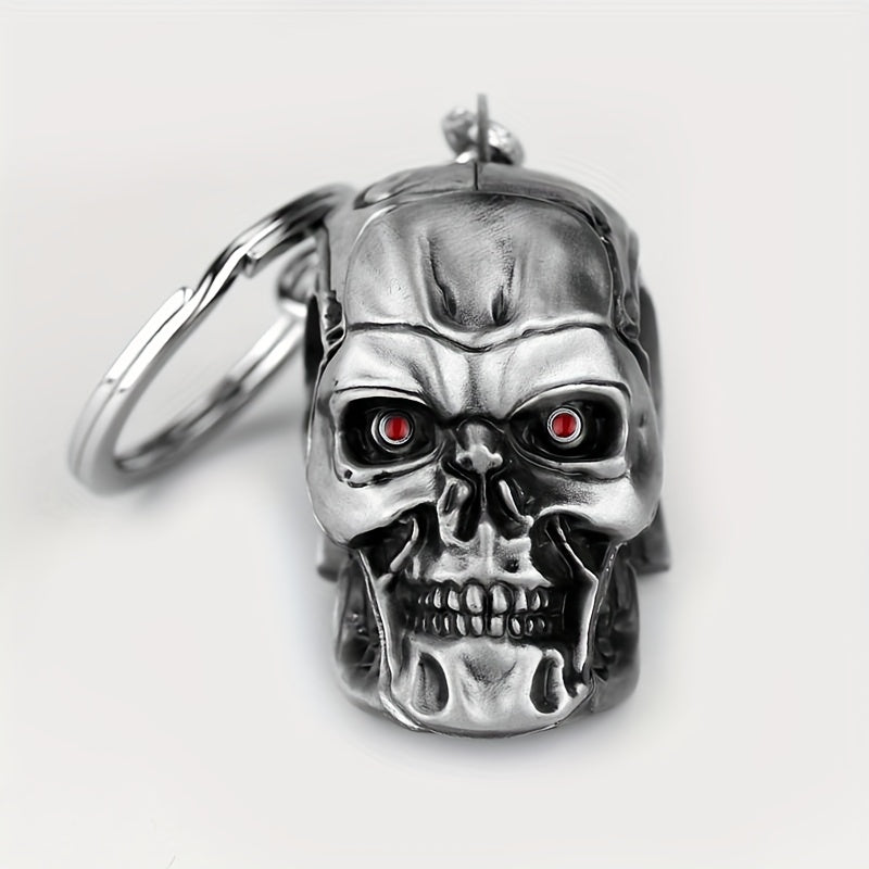 A stylish and versatile Terminator skull keychain that has a personality inspired by movies and TV shows. It is adorned with a golden pendant, adding an extra touch of flair.