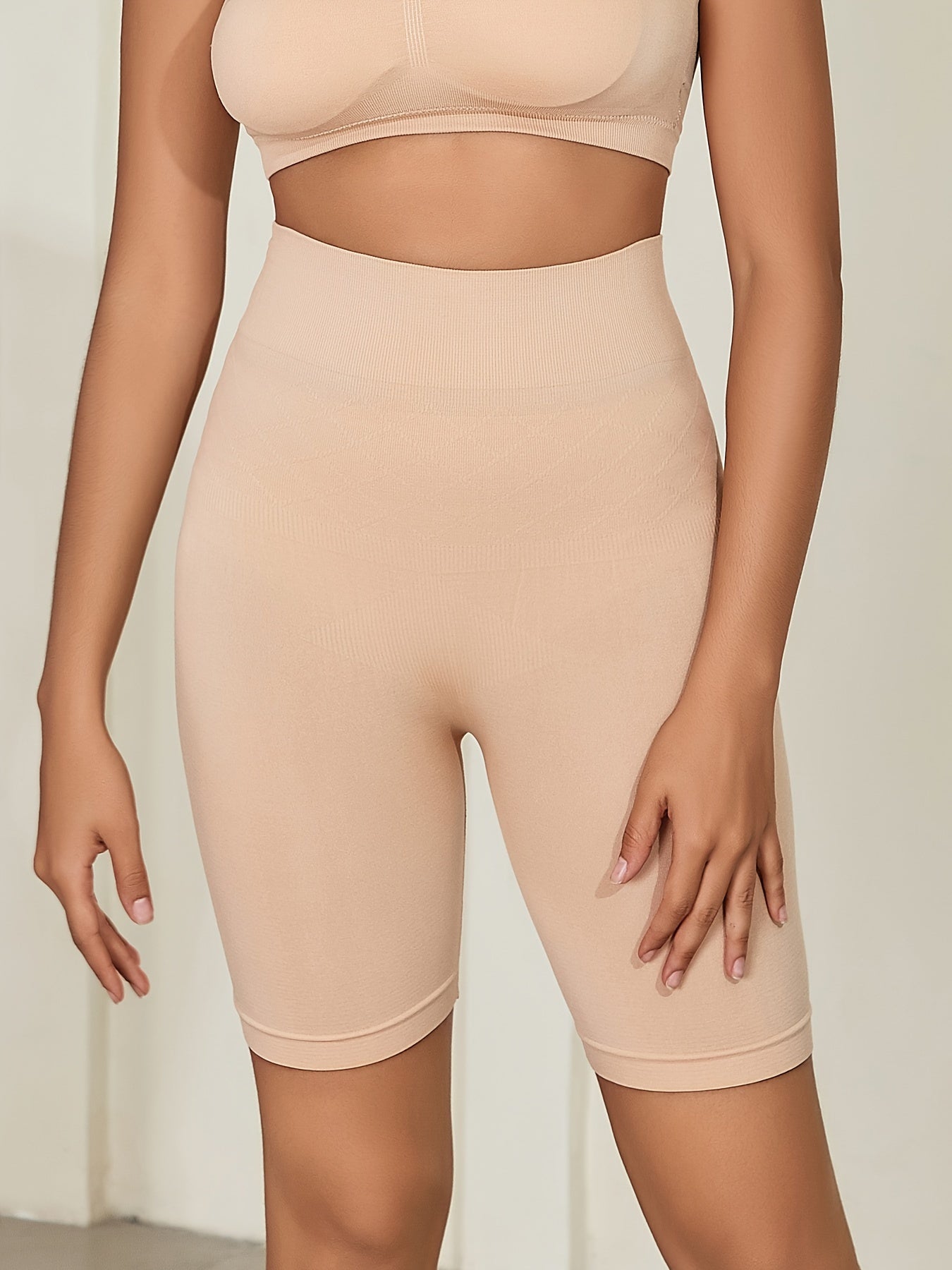 Control body butt lifting pants with high waist, seamless boxer briefs for women that are non-marking and anti-glare, with non-rolling leggings.