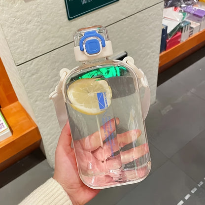 Portable square water bottle with adjustable shoulder strap for travel, sports, and camping. Hand wash only. Lightweight round plastic bottle that is PVC free.