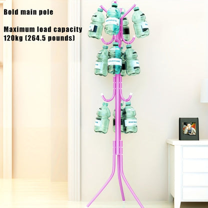 Multi-purpose, freestanding black metal coat rack with tree-style design for hanging clothes and hats in the bedroom.