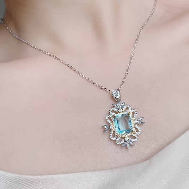 Stylish and lavish 14K gold plated alloy pendant necklace featuring synthetic crystal and imitation topaz, designed in a fashionable European style with high carbon drill rhinestones for women. Perfect for everyday wear and as a gift.