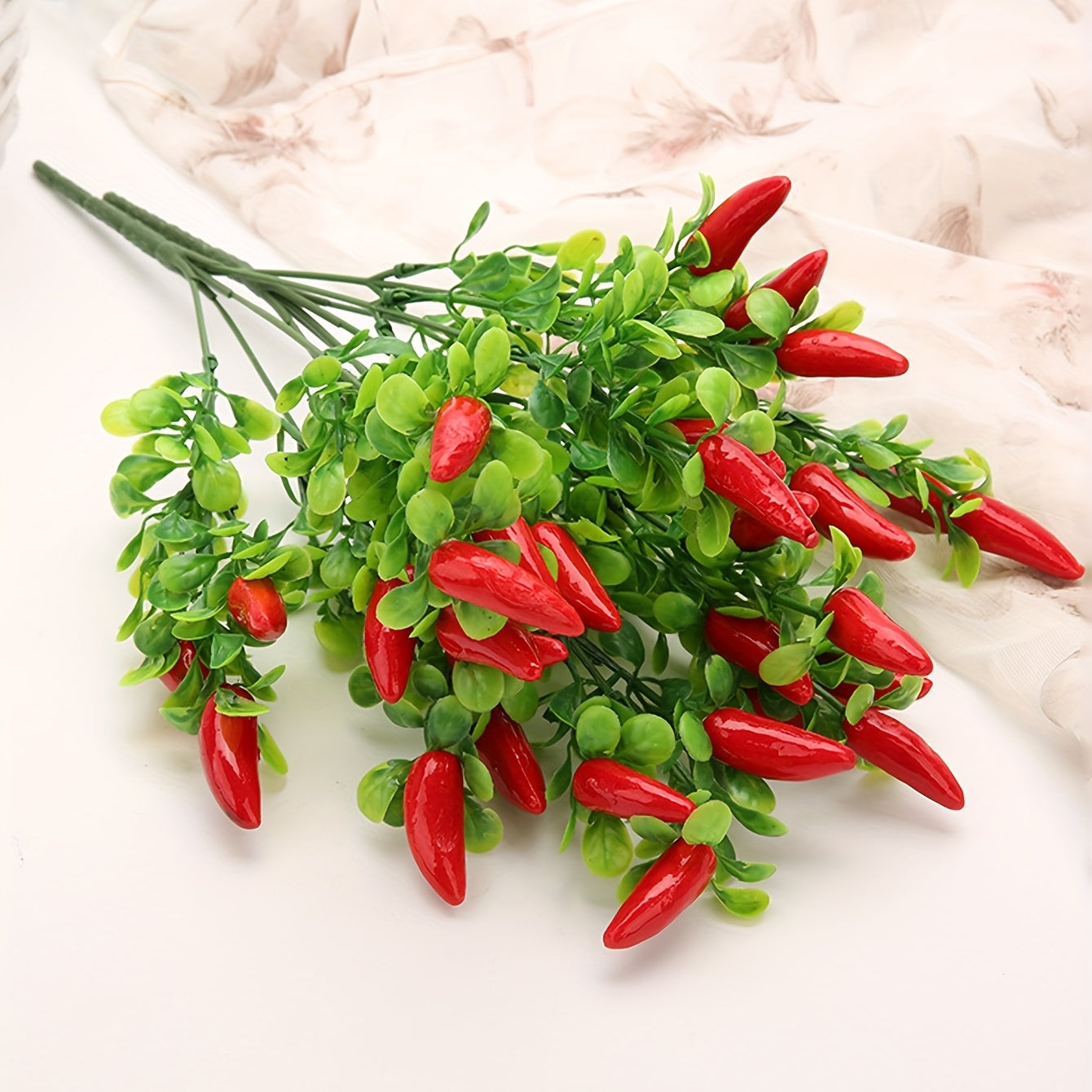 Artificial pepper chili flower bouquet for indoor or outdoor decor.