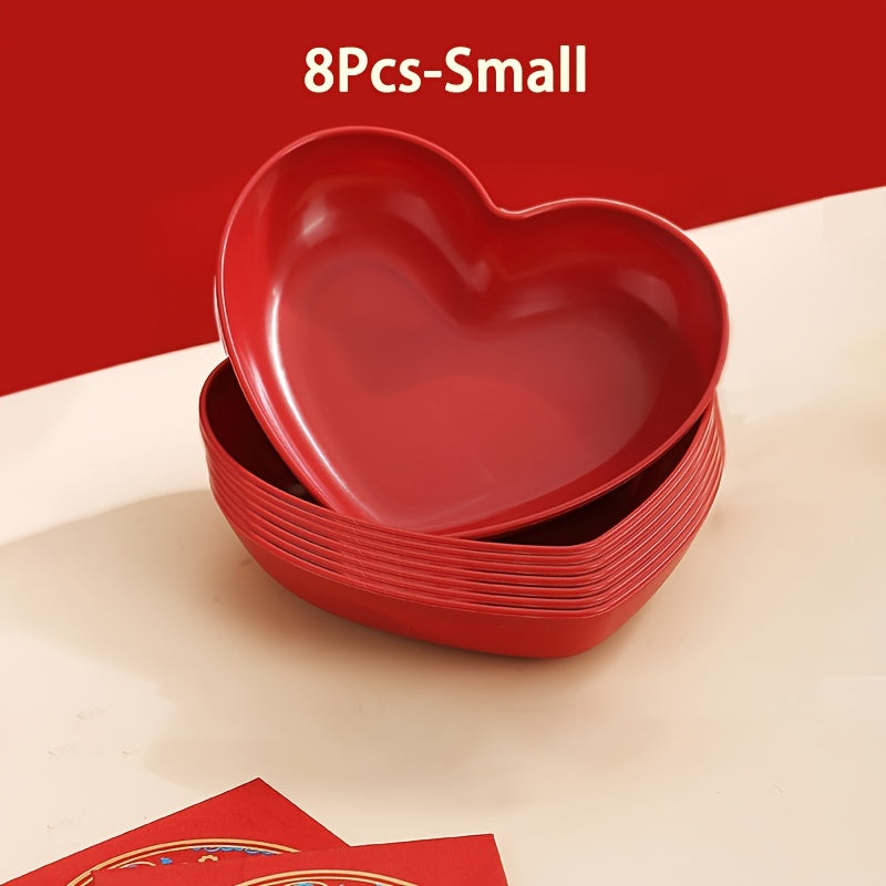 Heart-shaped plastic plates for weddings in sets of 4 or 8. Decorative red serving dishes for snacks, salads, and candy. Versatile party platters for all seasons.