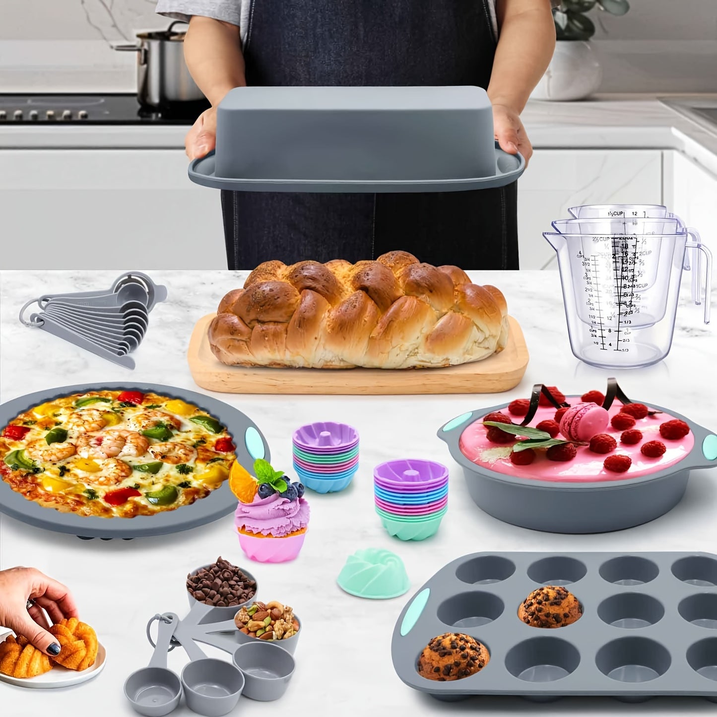 Silicone baking set includes 45 pieces, including various molds, pans, cups, and tools for the kitchen.