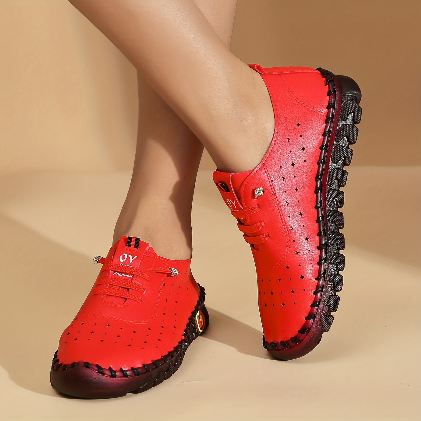 Flat lace-up shoes for women with hollow out design, breathable material, and solid color sneakers for walking.