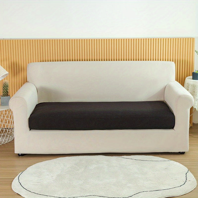 Waterproof Jacquard Sofa Slipcover protects furniture with elastic cover. Polyester material enhances home decor.