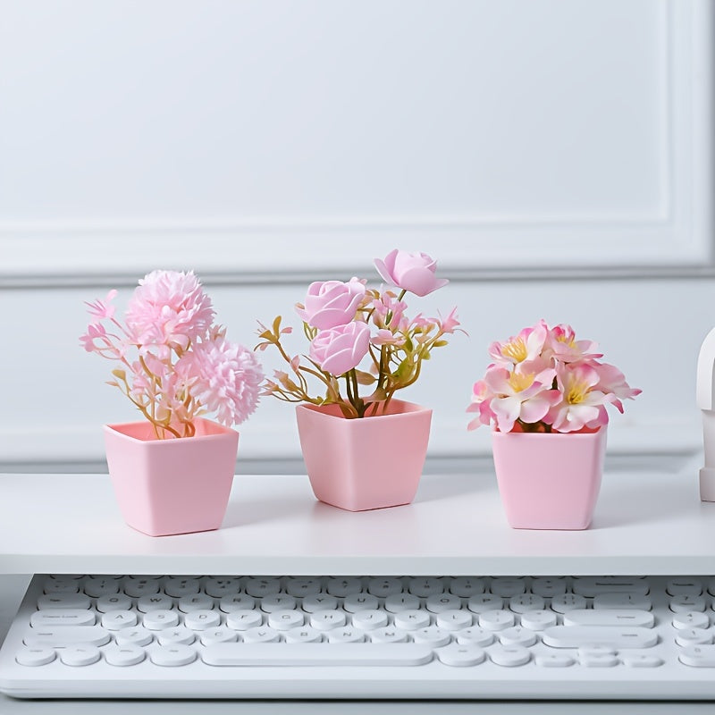 3 mini pink potted plants with faux rose and peach embroidered ball flowers for wedding, home, or office decoration.