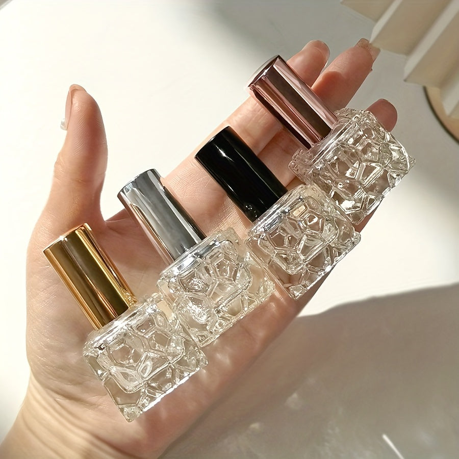 Four stylish square 10ml perfume bottles, perfect for travel, with water cube spray bottles for easy transfer.