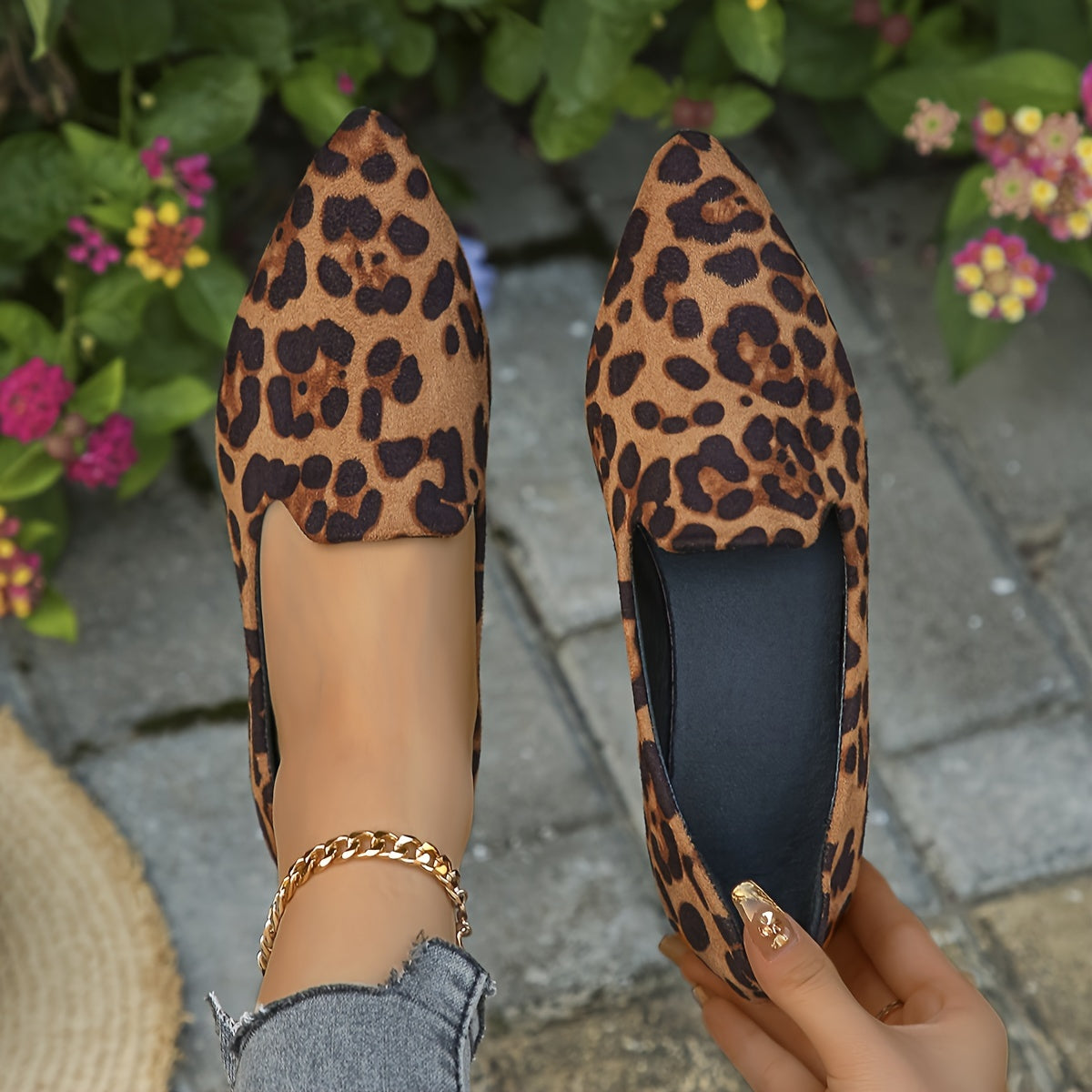 Leopard print slip-on flats with pointed toe and velvet upper.