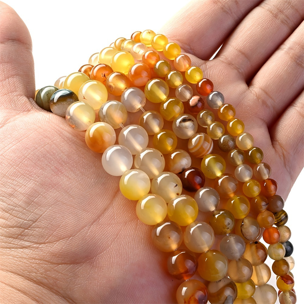 Set of Natural Stone Beads in sizes 6mm, 8mm, and 10mm, including Amber Agate round spacer beads for creating jewelry. Perfect for DIY bracelets and necklaces.