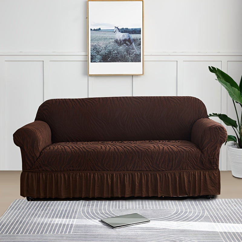 Wave pattern sofa slipcover with skirt, non-slip and dustproof. Protects furniture from cat scratches. Machine washable for easy cleaning. Suitable for bedroom, office, or living room décor.