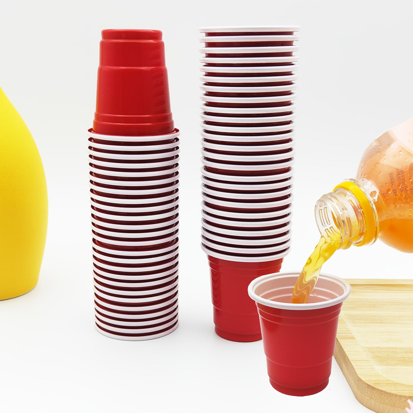 50 two-tone 2oz plastic party shot cups for various occasions like weddings, banquets, parties, and outdoor events.