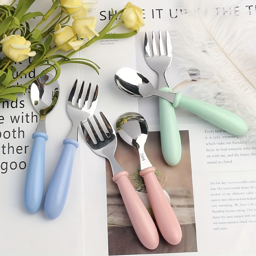 6-piece flatware set made of stainless steel spoons and forks with safe rounded edges and BPA-free handles, designed for easy cleaning and featuring an ergonomic design suitable for young hands.