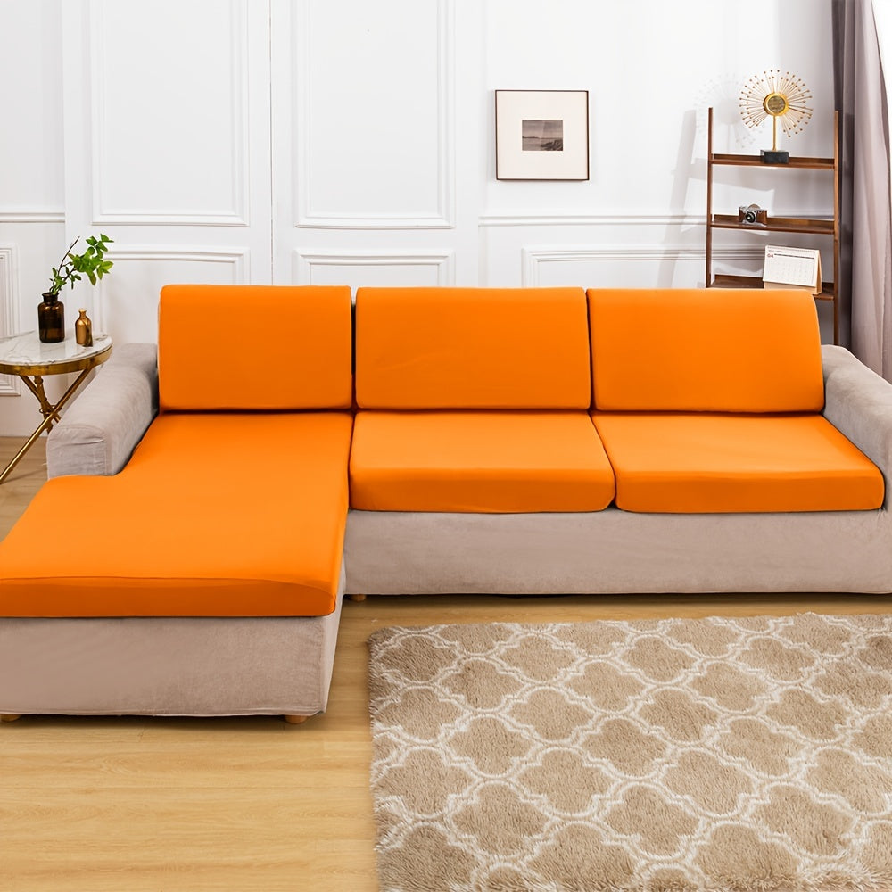 Stretch sofa seat cover to protect living room cushion.