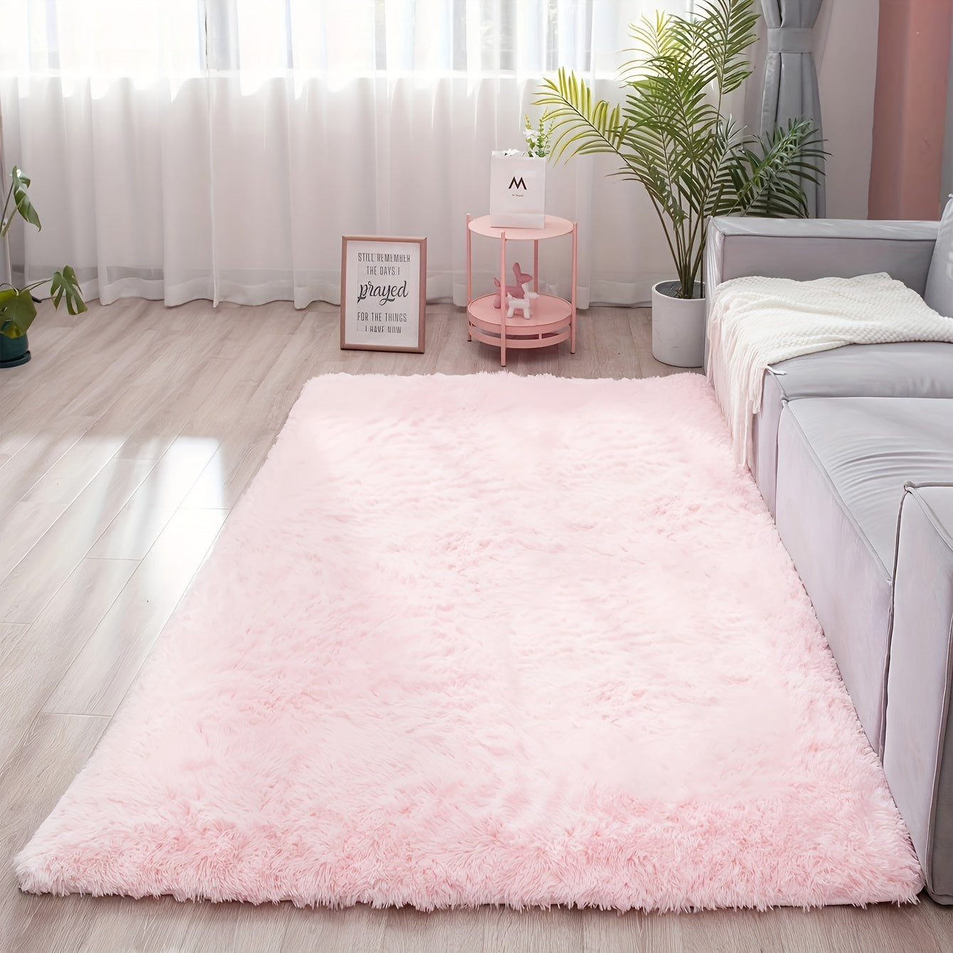 Soft and fluffy rectangle area rug perfect for your bedroom. This plush carpet is thick and non-slip, making it ideal for your living room. Made with machine-made polyester fiber, this low-pile rug is washable for easy cleaning. Perfect for indoor use.