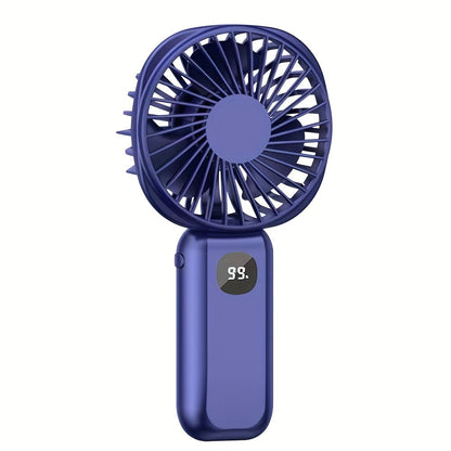 This portable handheld fan features a built-in battery capacity display and can be powered by USB or batteries. It also doubles as a convenient phone holder and is compact and easy to transport. Perfect for both handheld and desktop use, this fan is a