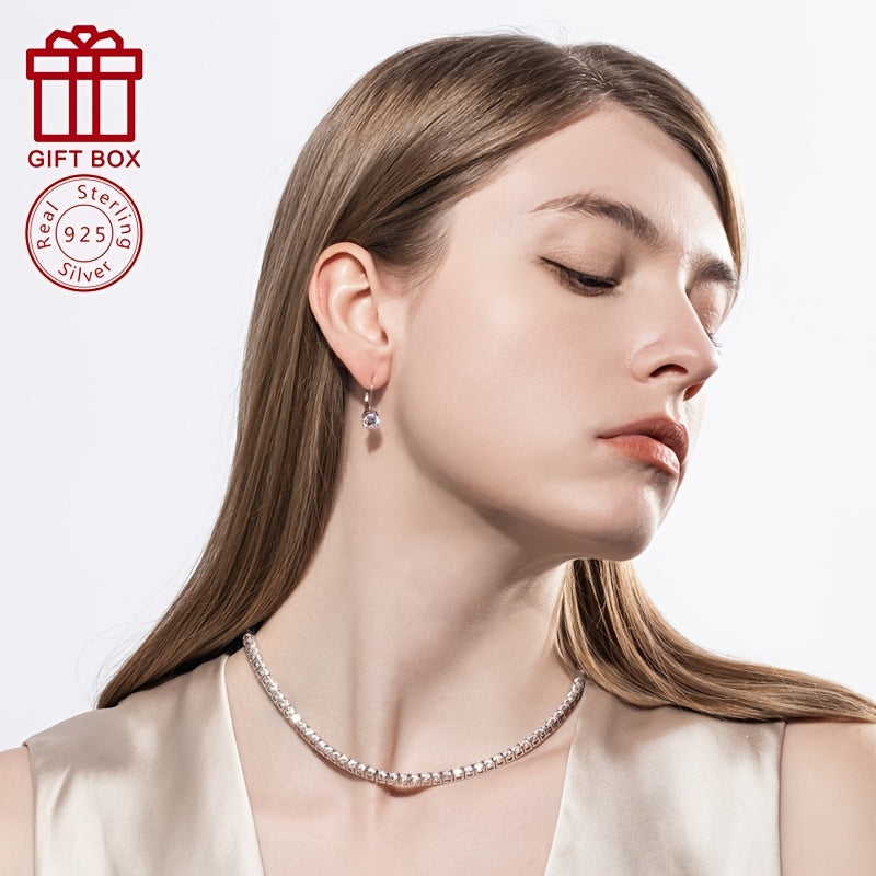 Luxurious and elegant, these gorgeous earrings are made of 925 sterling silver and feature a dazzling moissanite gemstone. Hypoallergenic and lightweight at approximately 2.1g, they are the perfect gift for a stylish girlfriend who loves to sparkle at