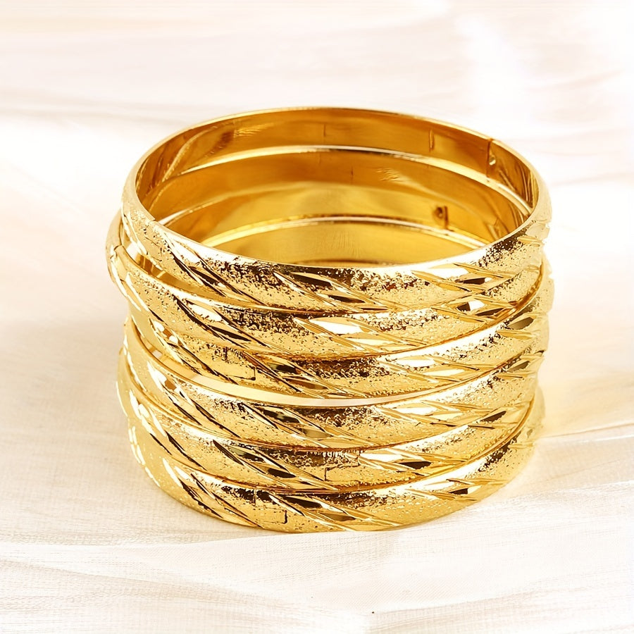 Set of 6 Middle Eastern style bangle bracelets, plated with 18K gold. This classical set is perfect for weddings, parties, and everyday wear for women.